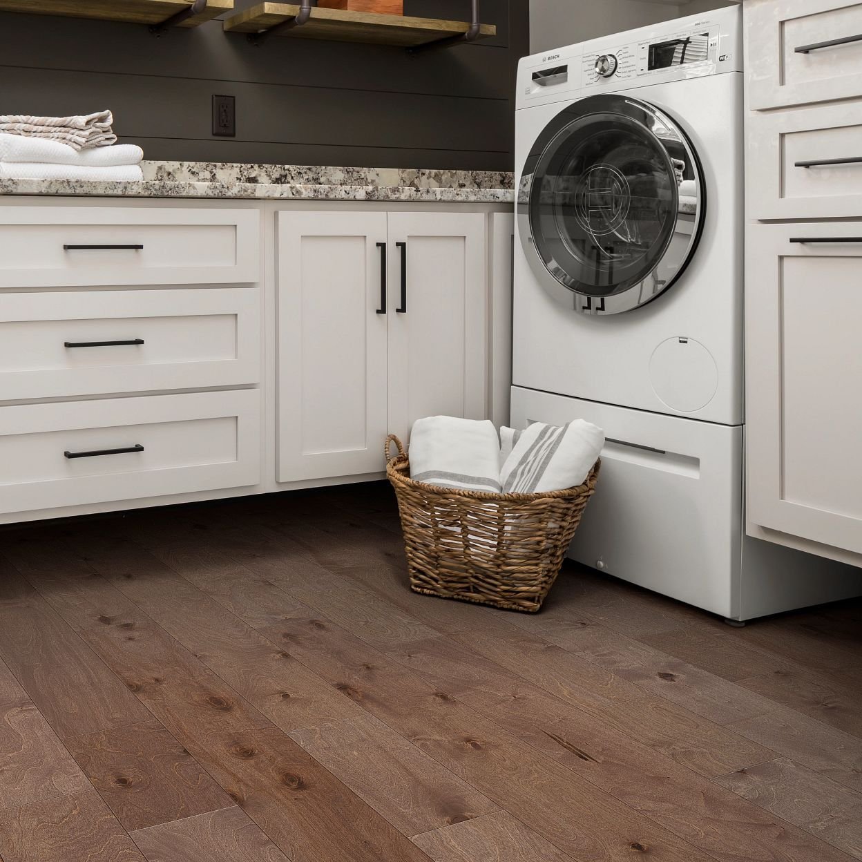 Brown hardwood floor for laundry room from Dishman Flooring on Houma, LA area